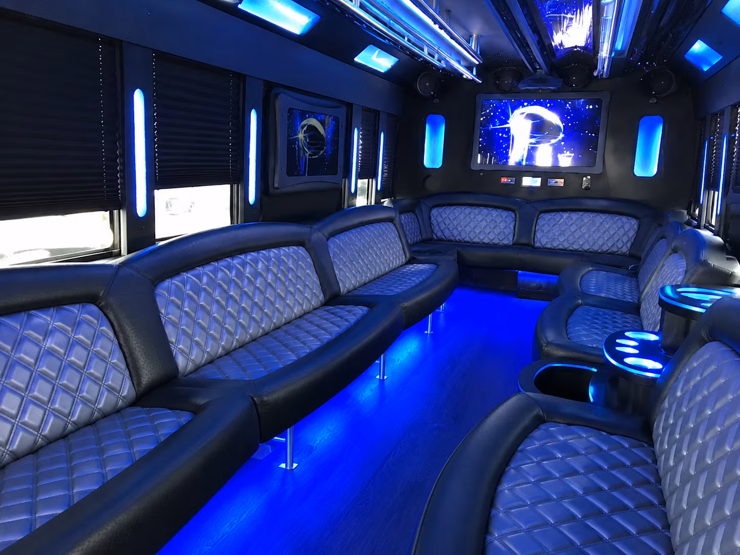 Group beside a Mercedes Sprinter limo in Little Rock