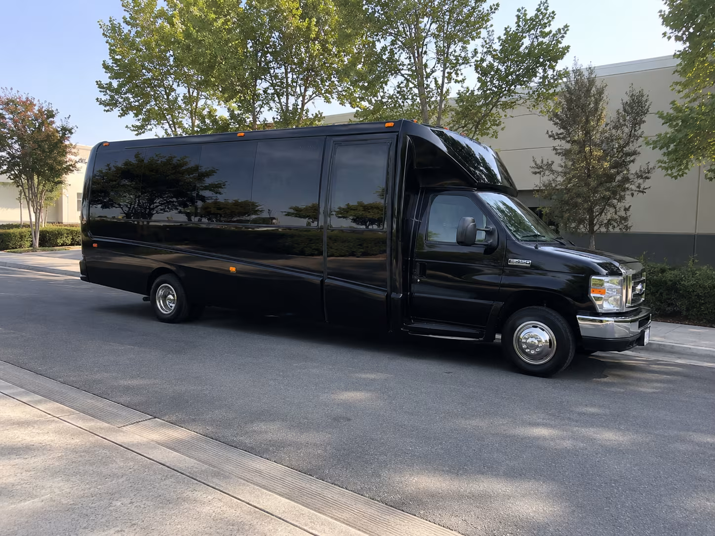 Wedding guests seated inside a party bus serving Little Rock